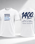 Two white short-sleeve T-shirts shown on a light gray studio background, front view on the left and back view on the right. The front has blue and light blue text reading 'WHEREVER I MAY ROAM, THE ROAD LEADS HOME.
