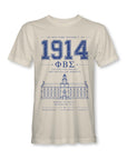 Natural/beige tee with 1914 Phi Beta Sigma emblem and building graphic in blue/white