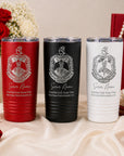 Three tumblers in red, black, and white with sorority symbols on a decorative background.