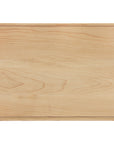 Wooden cutting board with a natural finish on a white background