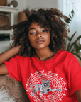 Red short sleeve T-shirt with white tiger face maze graphic worn by a model