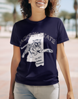 Navy short-sleeve T-shirt with front tiger logo graphic, worn by smiling woman.