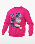 Pink unisex sweatshirt with festive football graphic and circular team logo on chest