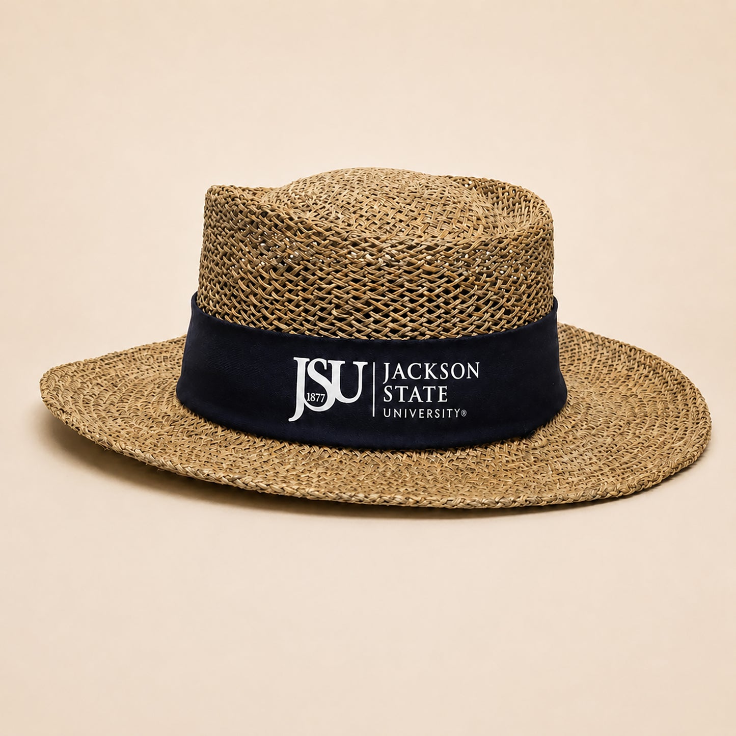 A woven straw fedora-style hat with a navy blue band featuring the white text 'JSU JACKSON STATE UNIVERSITY'.