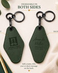 Luxury green Junior League motel keychain styled with notebook, gold pen, and keys in an elevated lifestyle flat lay