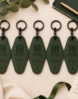 Executive officer collection of Junior League motel keychains engraved with leadership titles including president and secretary