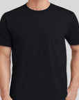 Black t-shirt worn by a person on a light gray background