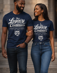 Two people wearing navy blue t-shirts with 'The Legacy Continues' text, standing close together.