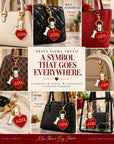 Delta Sigma Theta I Heart DST bag charm styled on cream, black, red and travel handbags and used with keys