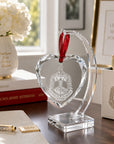Engraved Delta Sigma Theta crystal heart displayed on an elegant crystal stand.