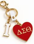 Delta Sigma Theta I Heart DST enamel bag charm and keychain with flat crimson heart, white I charm and gold-tone hardware