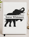 White Delta Sigma Theta leatherette notebook featuring an elephant silhouette with personalized Soror Whitmore engraving.