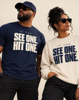 Black models wearing If You See One Hit One graphic T-shirt and crewneck sweatshirt.