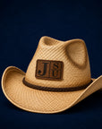 Jackson State JSU cowboy straw hat with walnut leatherette patch on deep navy background