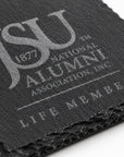 Close-up of a Jackson State University Life Member engraved slate coaster highlighting the crisp laser engraving, natural slate texture, and chipped stone edges.