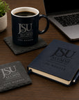 Jackson State University Life Member engraved slate coasters displayed on an executive desk beside a coffee mug, journal, laptop, and premium office accessories.