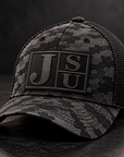 Jackson State Black Camo New Era 39THIRTY Stretch Tech Mesh cap with tone-on-tone black Block JSU leatherette patch