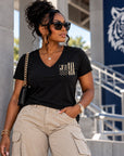 Black woman wearing Jackson State Tigers Salute to Service black V-neck T-shirt