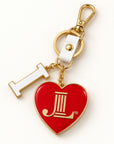 Junior League enamel bag charm keychain with red JL heart, white I charm, gold key ring and lobster clasp