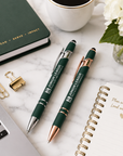 Junior League executive stylus pens styled on an elegant desk flat lay with notebook and office accessories