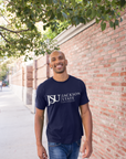 Unisex crew neck navy T-shirt with Jackson State logo on chest, model wearing