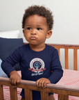 Infant long sleeve bodysuit, navy blue with round college logo graphic on chest
