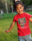 Toddler red crewneck t-shirt with front graphic print and short sleeves