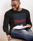 Black long-sleeve crewneck T-shirt with stacked Tigers text and tiger mascot graphic