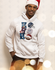 Cream unisex pullover hoodie with holiday graphic and team logo on front, worn by model