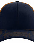 Navy blue and brown trucker cap on a white background