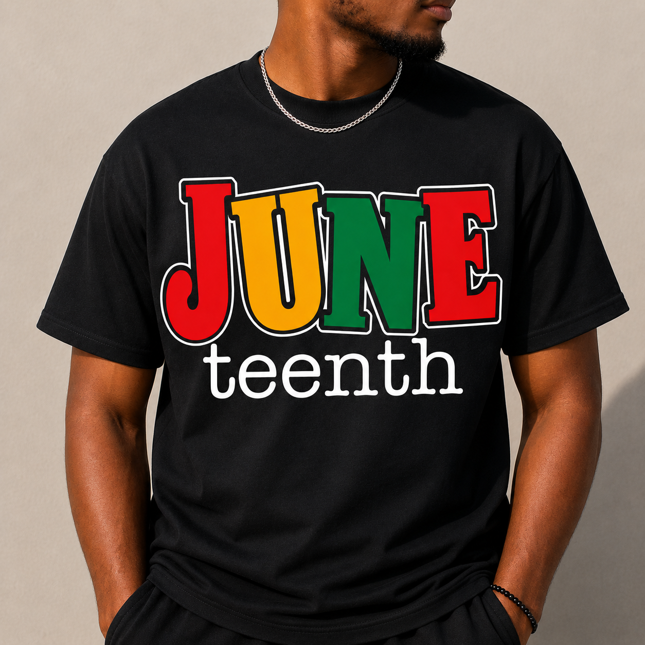 Black Juneteenth graphic T-shirt with large “JUNE teen th” lettering
