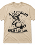 Sand western graphic t-shirt featuring A Hard Head Makes a Soft Ass donkey illustration by The Coleman Twinz LLC
