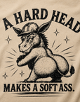 Close-up detail of distressed western donkey graphic printed on sand colored t-shirt