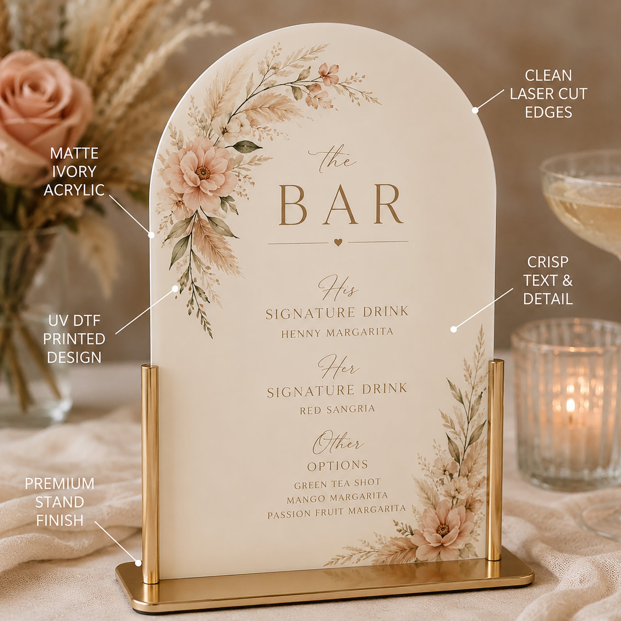 Decorative bar sign with floral design and gold stand on a table setting.