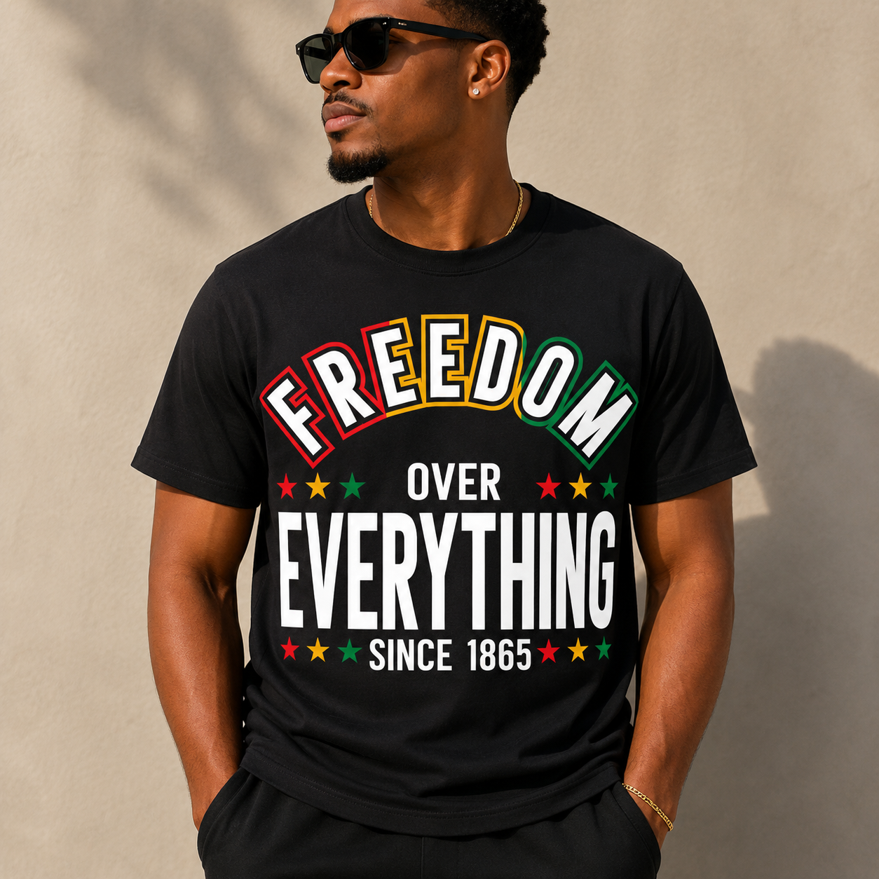 Black Juneteenth graphic T-shirt reading “FREEDOM OVER EVERYTHING since 1865”