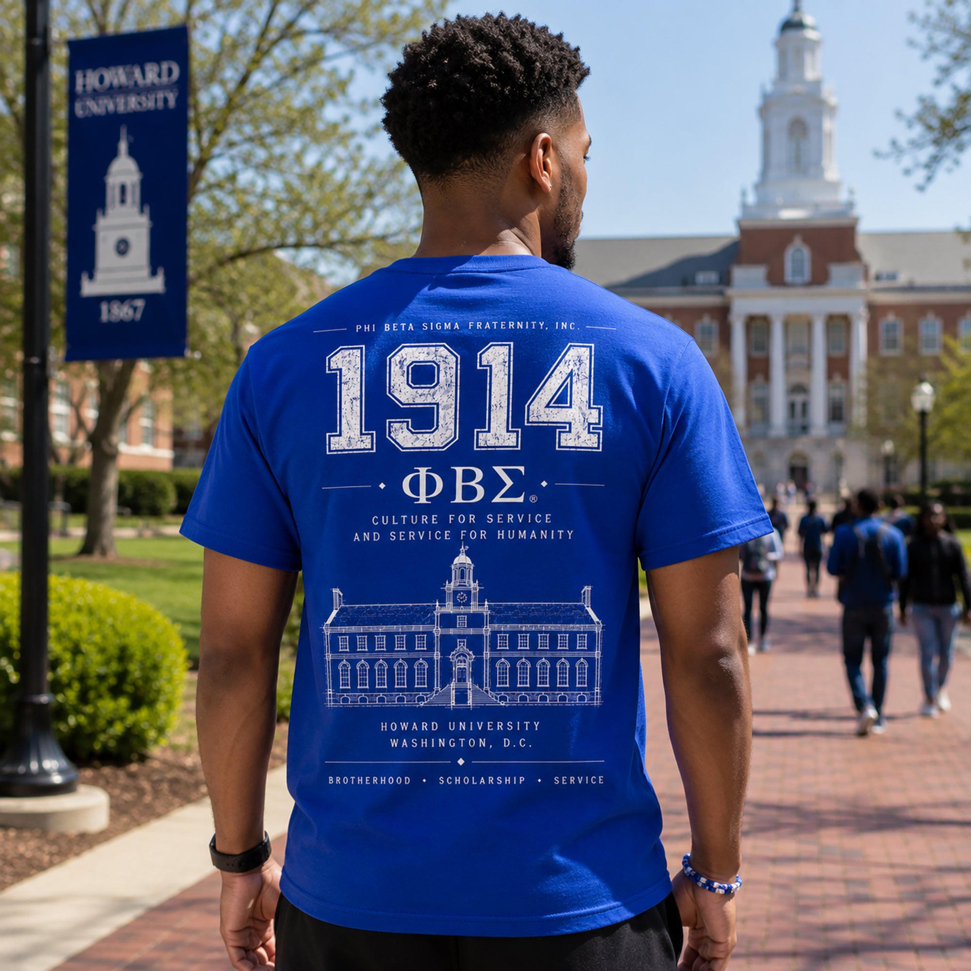 Back of Phi Beta Sigma 1914 shirt displaying Howard University artwork and fraternity motto