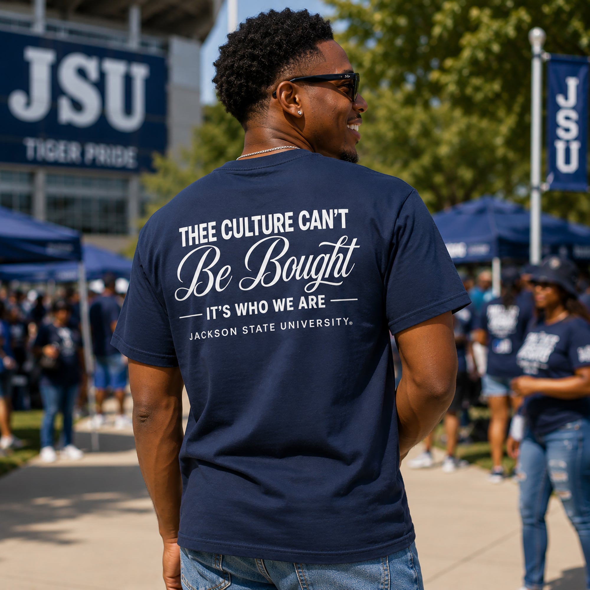 Person wearing a navy blue t-shirt with a message at Jackson State University