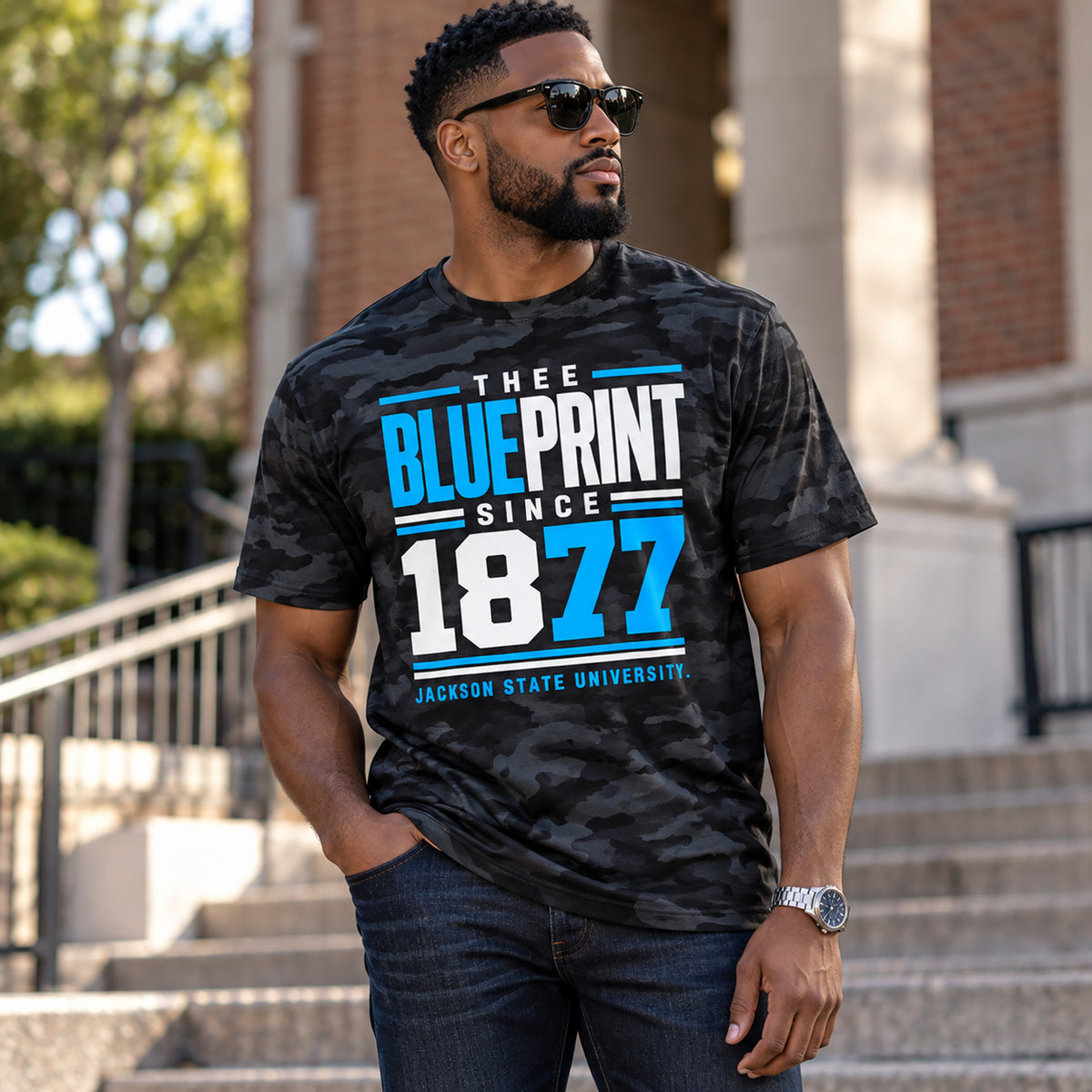 Black male model wearing Jackson State Thee Blueprint Black Camo T-Shirt