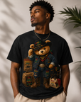 Black T-shirt with teddy bear graphic wearing a denim jacket and patch-style Juneteenth artwork