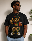 Black T-shirt with teddy bear graphic holding a red cup and wearing a Juneteenth 1865 cap