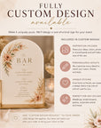 Decorative sign with floral design and text, surrounded by flowers and candles, with promotional text about custom design services.