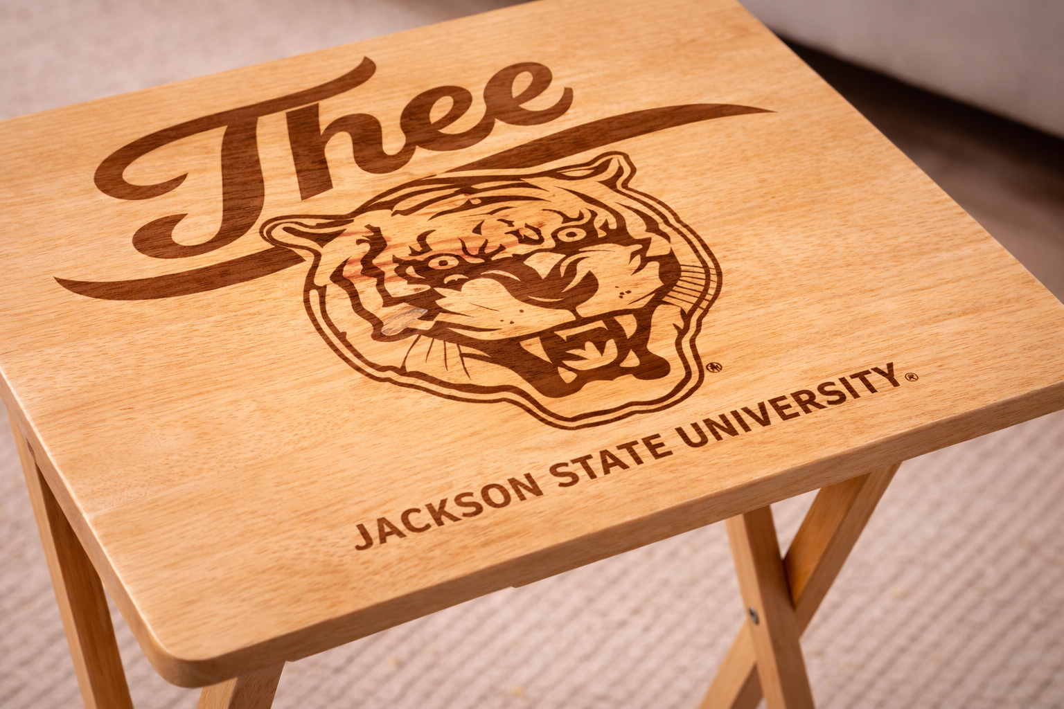 Walnut folding tray table with engraved “J’thee” logo and Jackson State University text