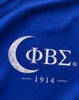 Close-up of Phi Beta Sigma Greek letters and 1914 front chest print on royal blue shirt