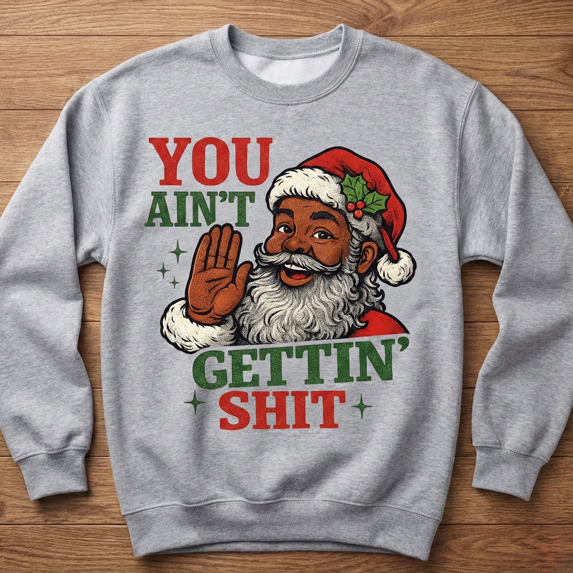 Heather gray crewneck sweatshirt with cartoon Santa graphic and bold slogan