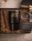 Gift box flat lay — tumbler, lid, straw, care card