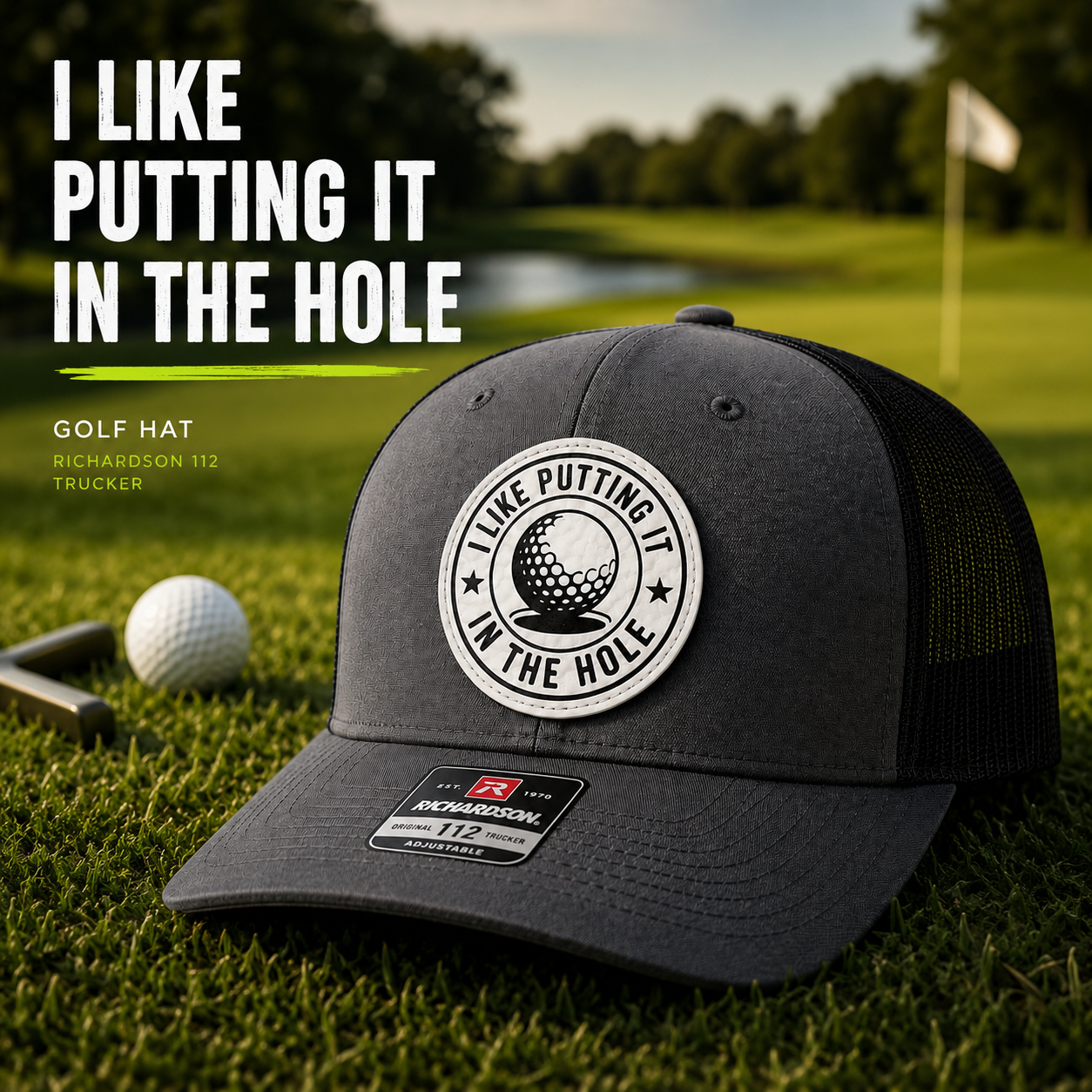 Dark gray trucker golf hat with black mesh sides and circular 'I Like Putting In The Hole' patch