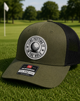 Golf trucker patch hat, olive front with white logo patch and black mesh back