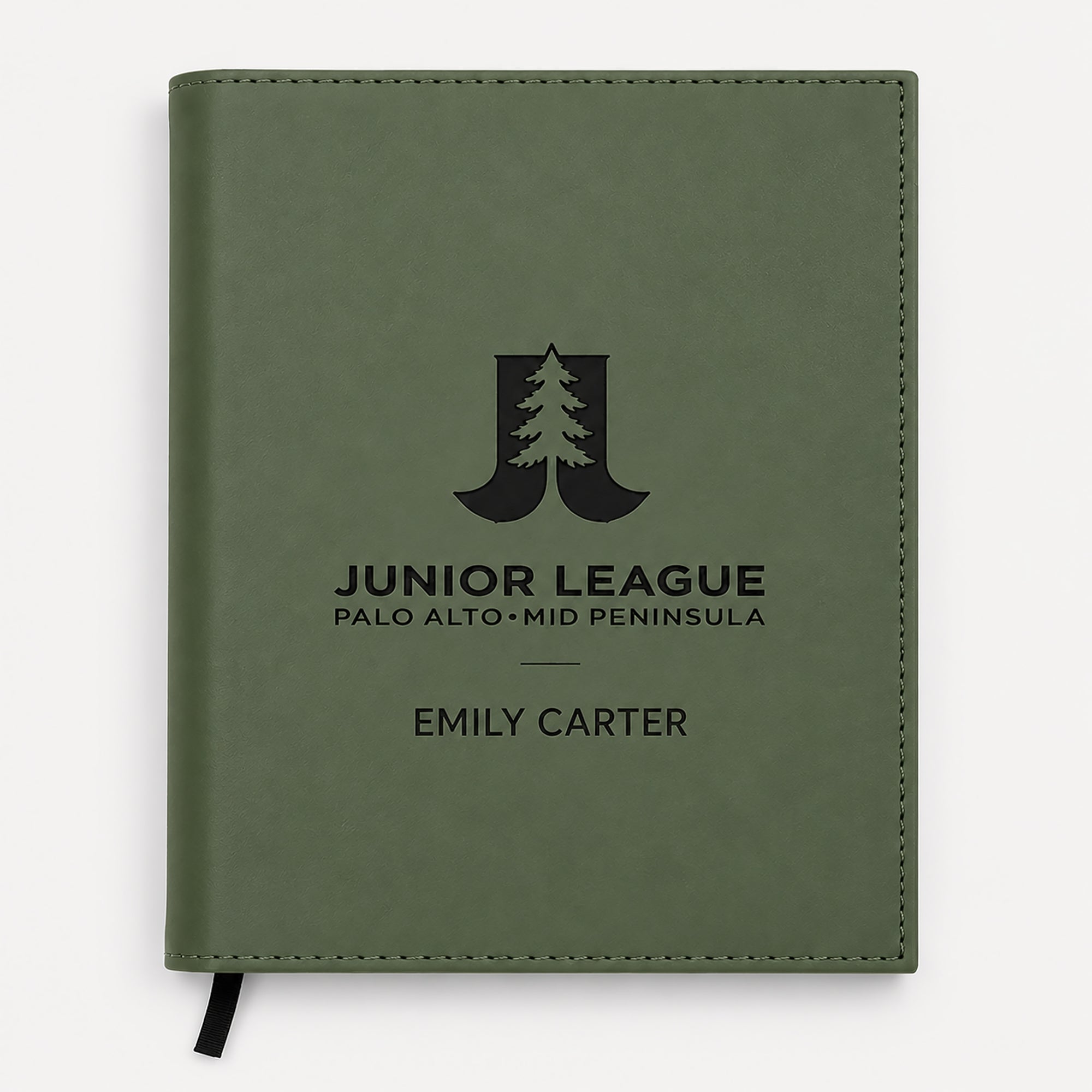 Green notebook with 'Junior League Palo Alto Mid Peninsula' logo and name on a white background
