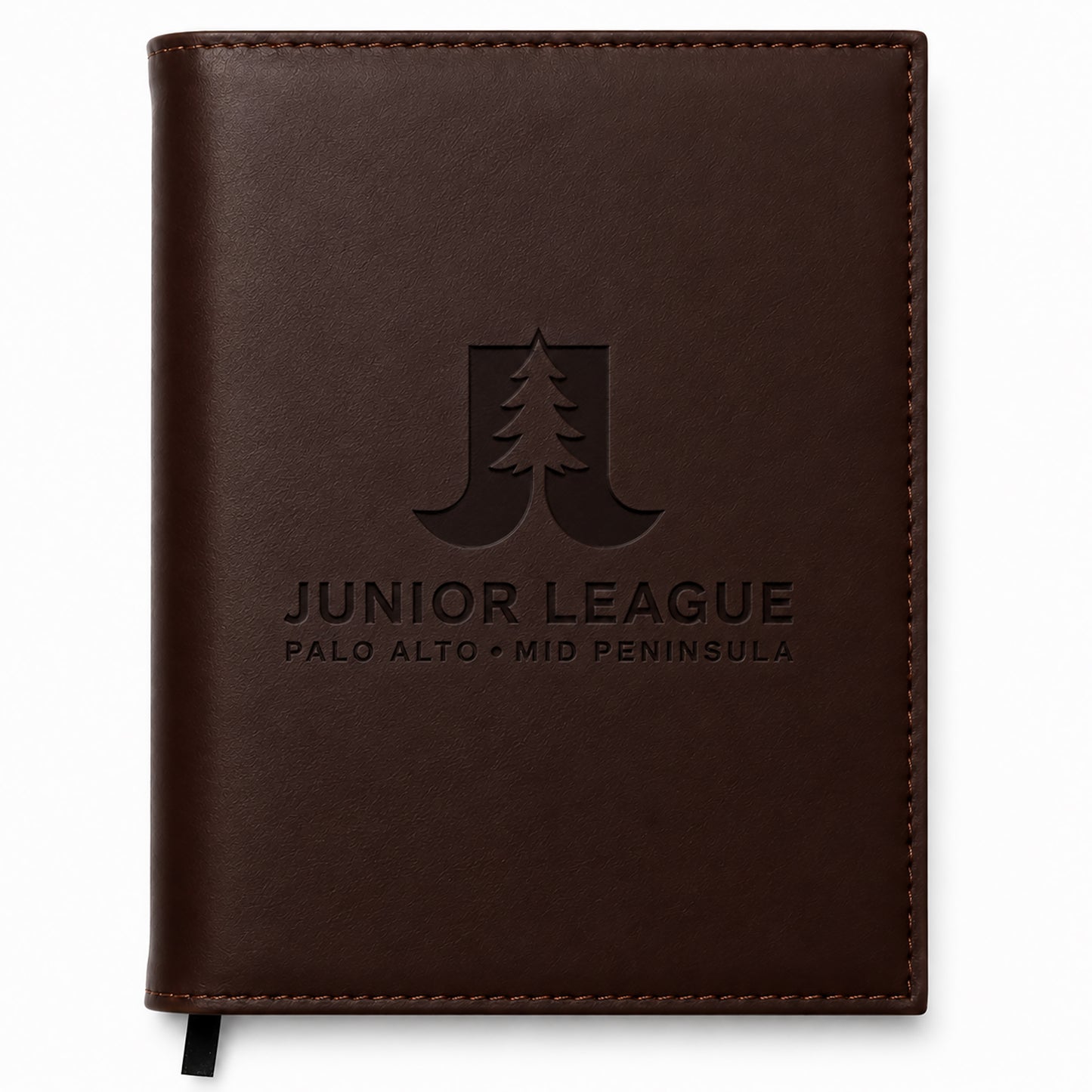 Brown leather notebook with 'Junior League Palo Alto Mid Peninsula' embossed on it