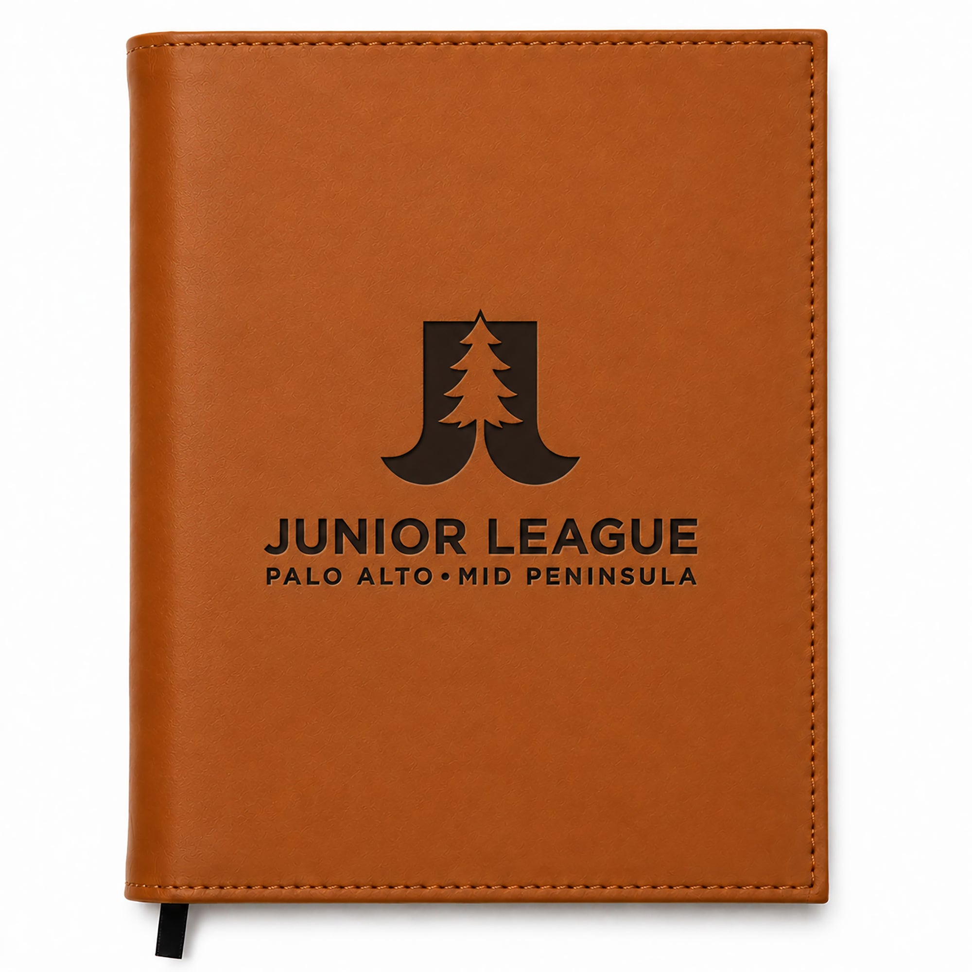 Brown leather notebook with Junior League logo and text on a white background
